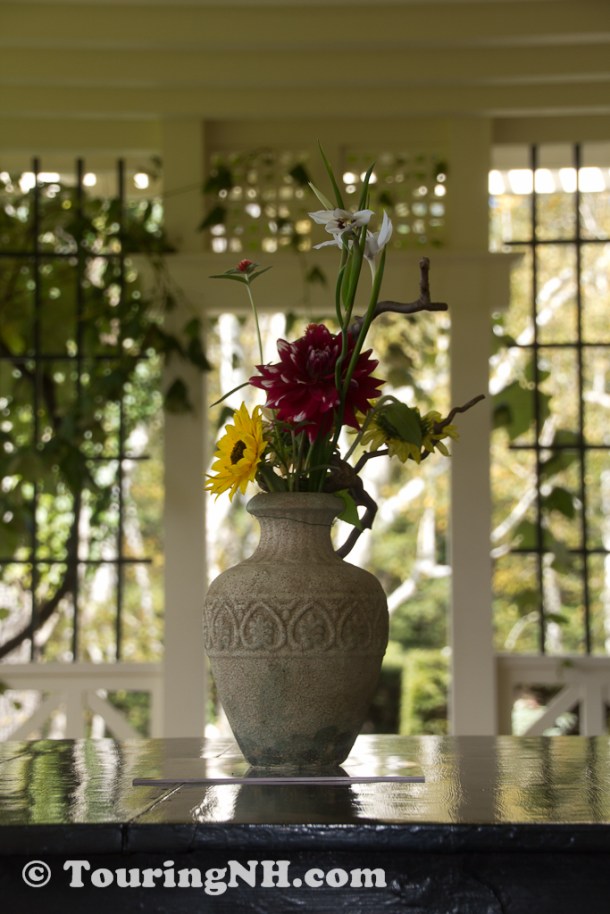 Flowers on the porch are from the gardens Saint-Gauden designed 