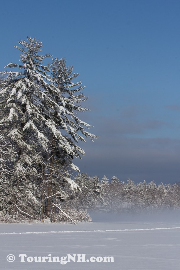 Greenfield - Fresh snow on the frozen lake.