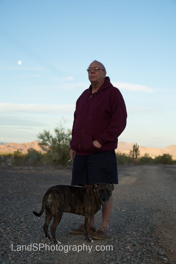 My dad and Molly watching the sunrise as the moon set behind them